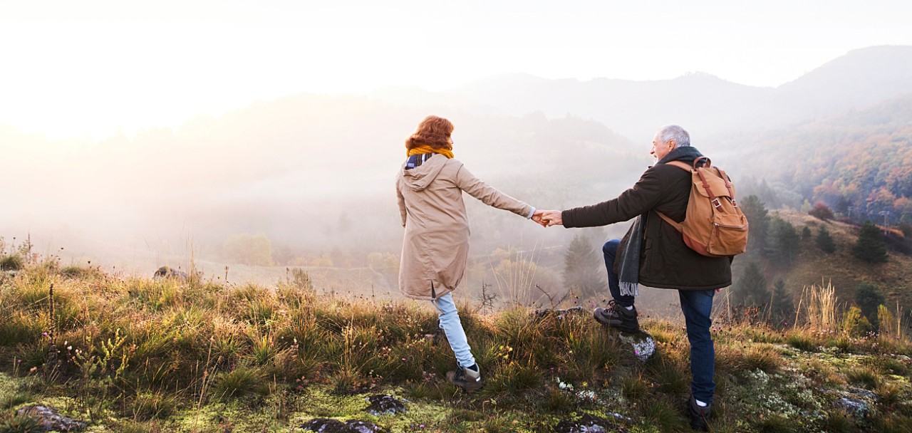 Senior couple on a walk in an autumn nature.; Shutterstock ID 1038815545; PO: 123