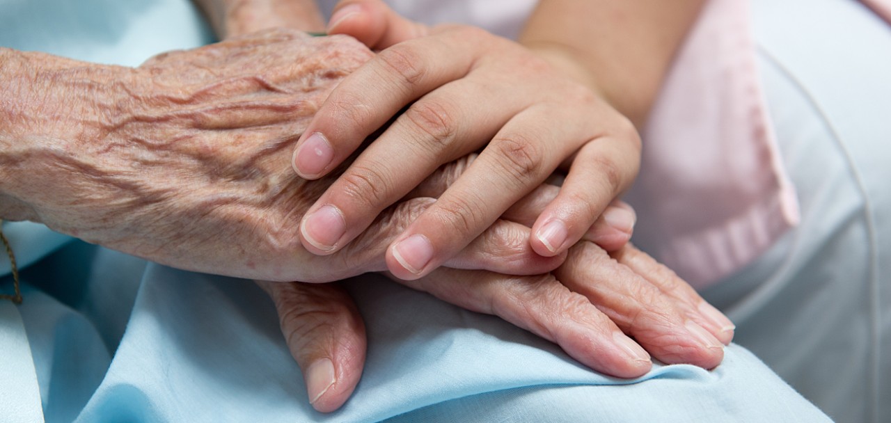 Young girl's hand touches and holds an old woman's wrinkled hands.; Shutterstock ID 115740043; PO: 123